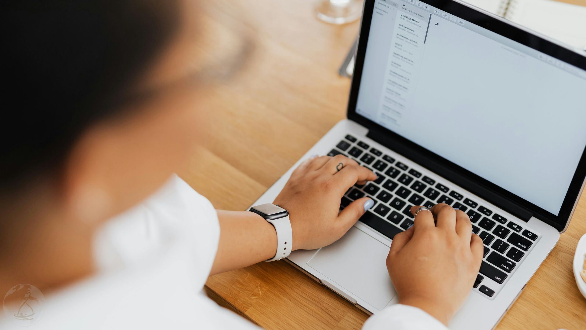 Close Up Photo of a Person Typing on Laptop