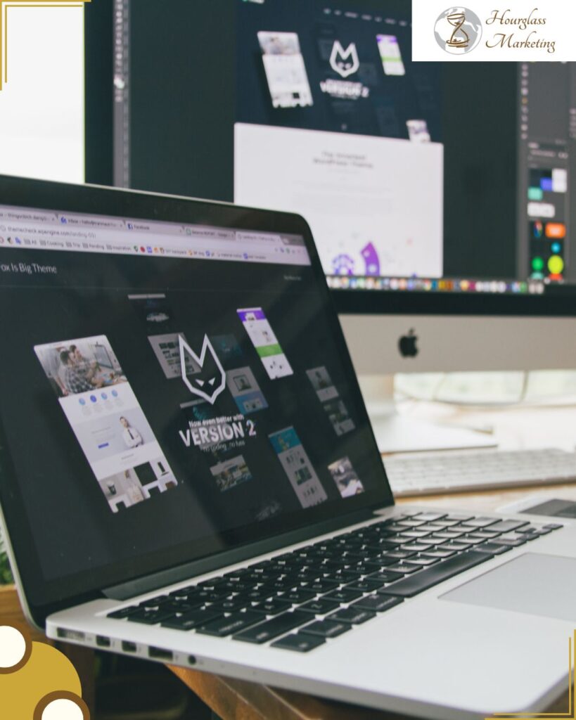 Macbook Pro Displaying Website Version 2 on Table