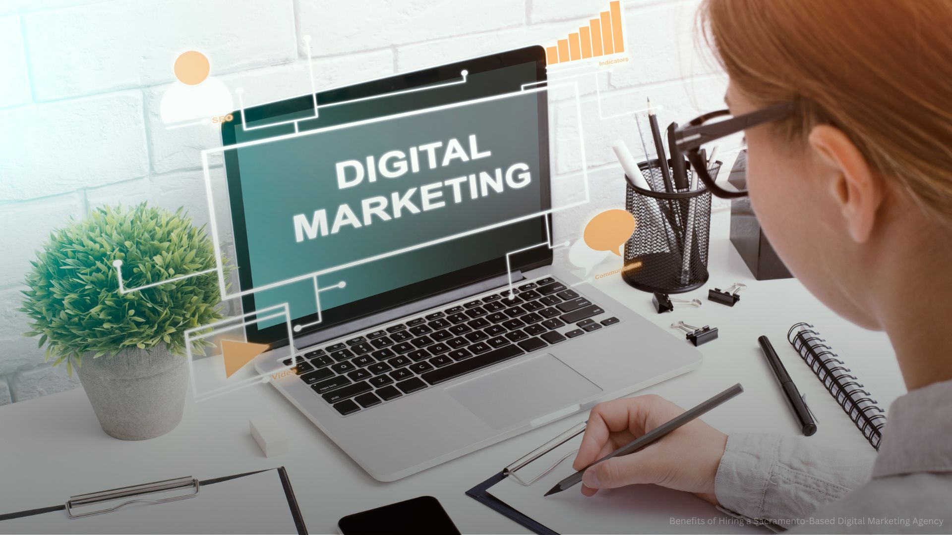 Manager of SMM agency taking notes from laptop screen